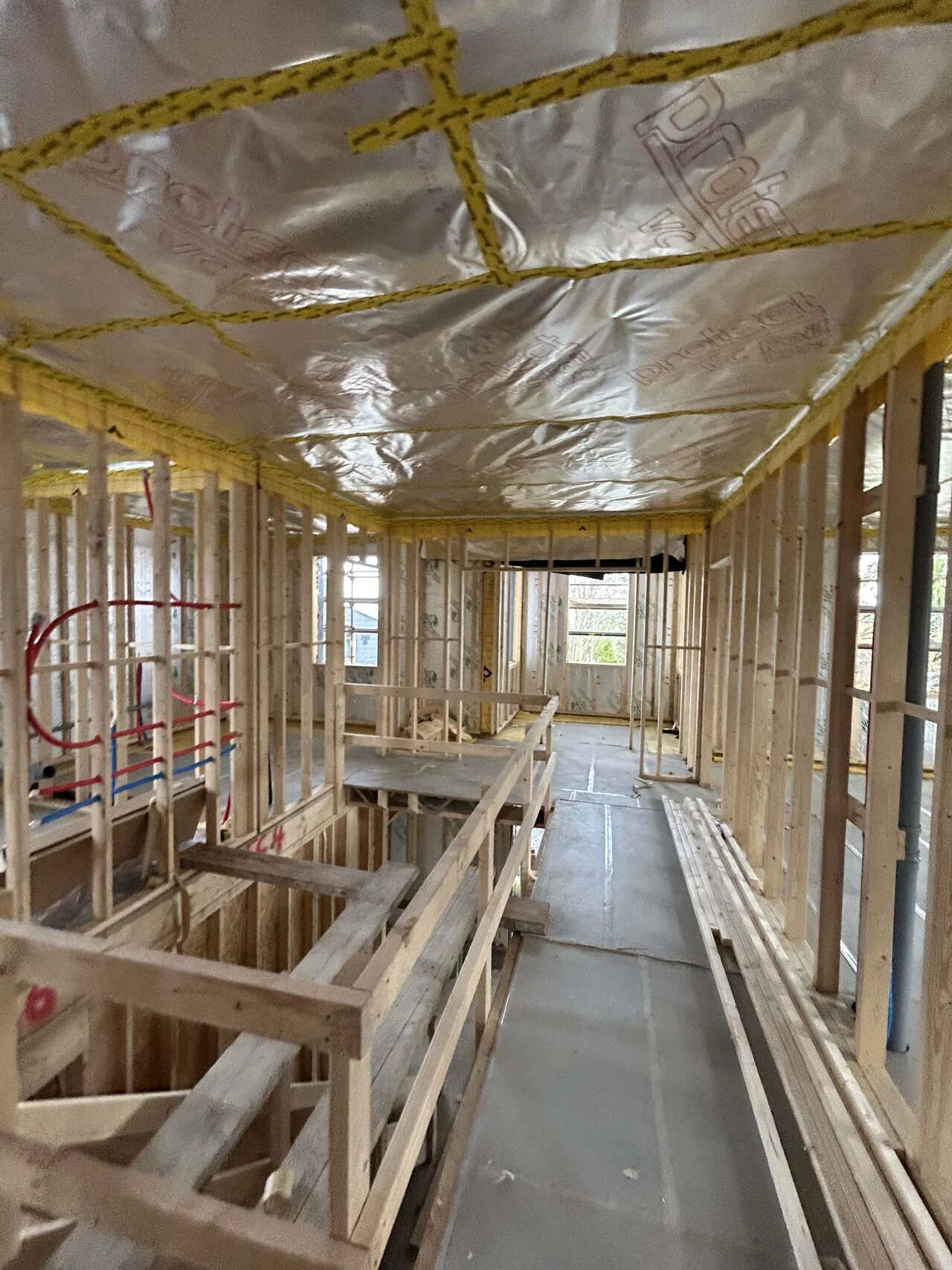 Airtight membrane and insulation installation by Sperrin Interiors during renovation